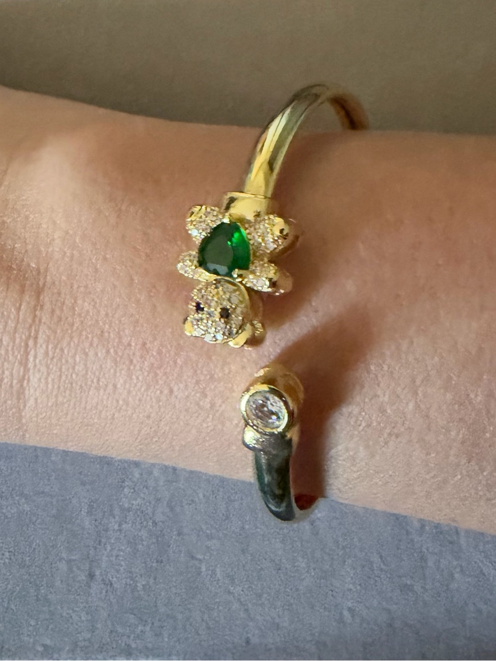 Gold-Tone Open Bangle Bracelet with Emerald Green Stone
